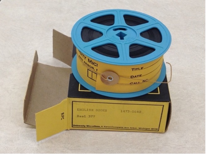 microfilm reel on top of box
